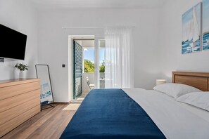 4 habitaciones, tabla de planchar con plancha, wifi y ropa de cama