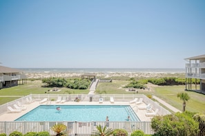 Pool - Oceanview Bliss: Walk to Everything from this Cheerful Beachfront Condo (Oak Island)