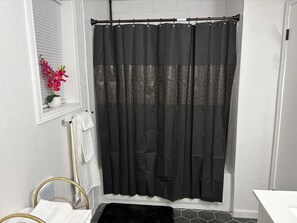 Hair dryer, towels, soap, shampoo