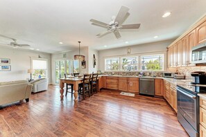 Fridge, stovetop, dishwasher, coffee/tea maker