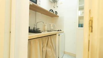 Comfort Apartment, Courtyard View | Private kitchen | Full-size fridge, oven, stovetop, espresso maker