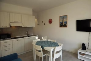 Apartment, 1 Bedroom, Balcony | Dining room - Terrace and Comfort by the sea (Castelsardo)