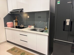 Design Apartment, 1 Bedroom, Balcony, Pool View | Private kitchen | Full-size fridge, stovetop, coffee/tea maker, rice cooker