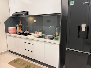 Design Apartment, 1 Bedroom, Balcony, Pool View | Private kitchen | Full-size fridge, stovetop, coffee/tea maker, rice cooker