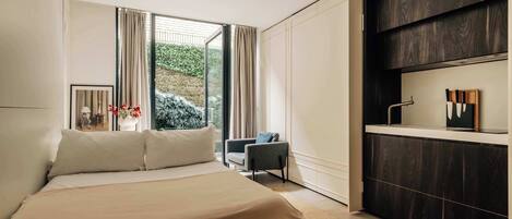 1 slaapkamer, een strijkplank/strijkijzer, wifi, beddengoed