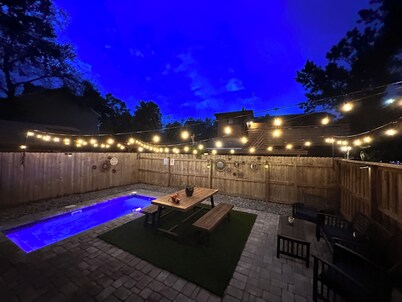 Charming bungalow with plunge pool located steps away from trendy Mills 50 area.