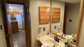 Hair dryer, towels, soap, toilet paper