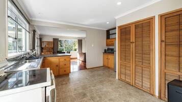 Fridge, microwave, cookware/dishes/utensils