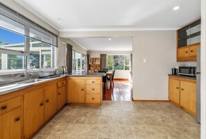 Fridge, microwave, cookware/dishes/utensils