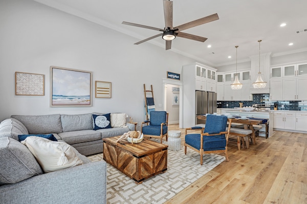 The open-concept layout connects the living, dining and kitchen areas.