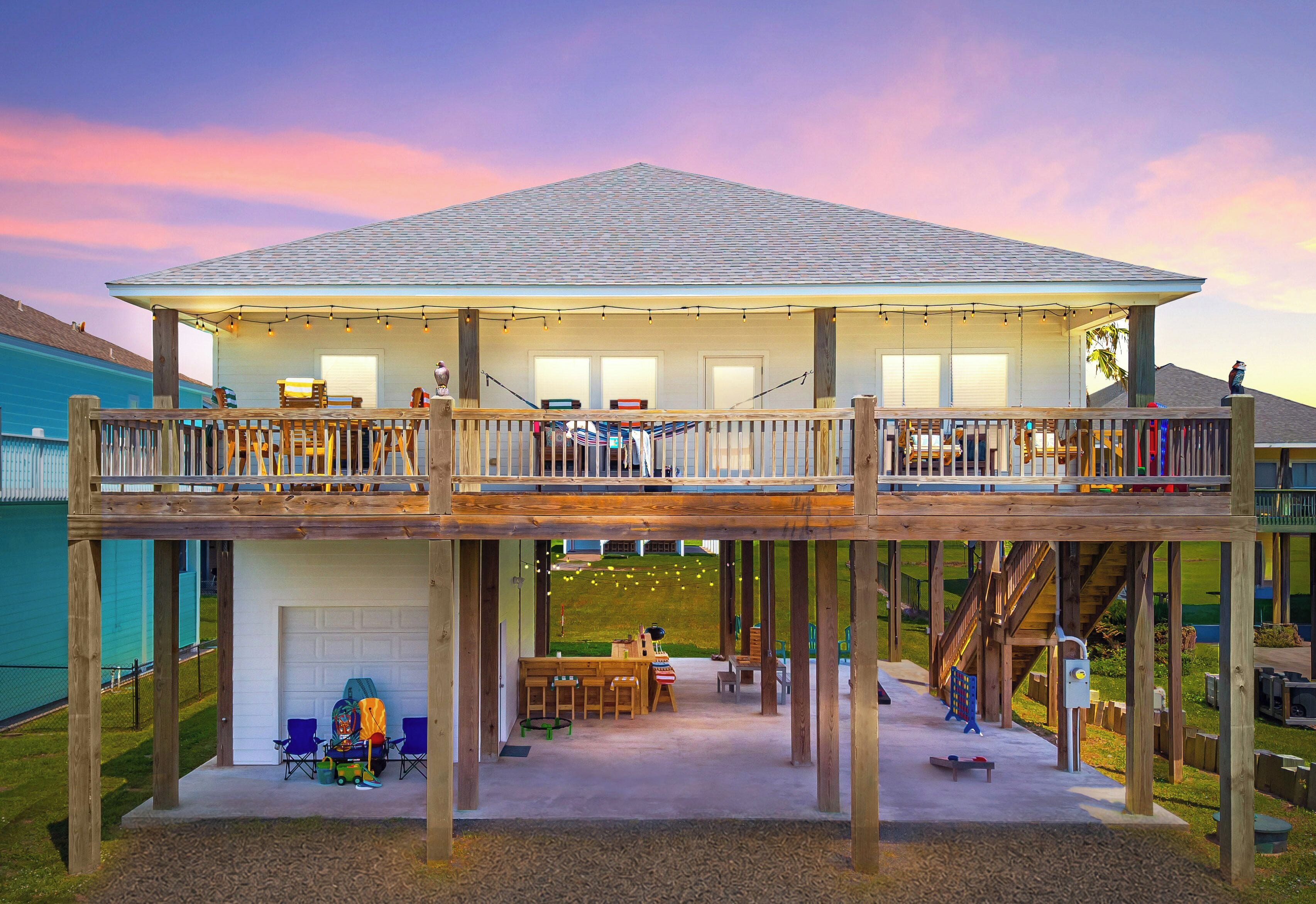 Welcome to Take It Easy—beautiful new 4BR/4BA beach house steps from the beach.