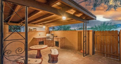 Serene 3BR retreat with Catalina Mountain views, shaded gazebo, BBQ grill & dog-friendly backyard.
