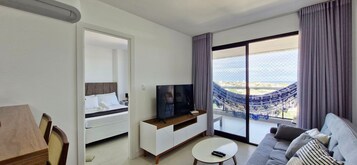 Basic Apartment | Living area | 40-inch Smart TV with digital channels, Netflix, streaming services