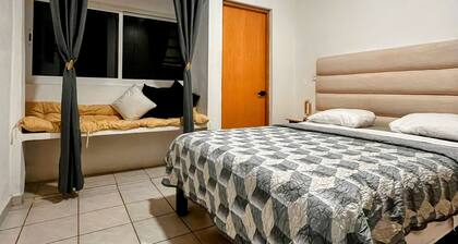 Air-conditioned house, electric gate, covered garage, lovingly decorated.