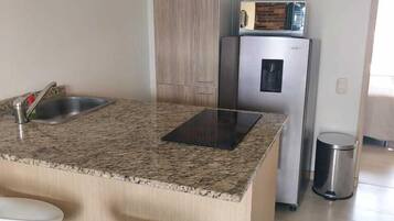 Microwave, blender, griddle, cookware/dishes/utensils