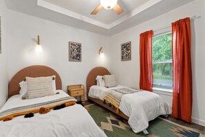 4 bedrooms, desk, iron/ironing board, travel cot