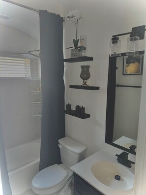 Hair dryer, towels, soap, shampoo