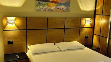 Deluxe Suite, 1 Bedroom, Garden View | 1 bedroom, Frette Italian sheets, premium bedding, down duvets