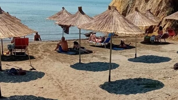 Private beach, white sand, sun-loungers, beach umbrellas