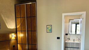 Deluxe Suite, 1 Bedroom, Garden View | 1 bedroom, Frette Italian sheets, premium bedding, down duvets
