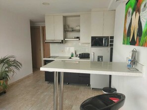 Standard Apartment, City View | Private kitchen | Microwave, stovetop, rice cooker, blender