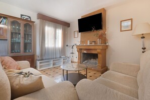 Televisión, chimenea