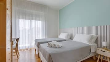 2 dormitorios, tabla de planchar con plancha, wifi gratis y ropa de cama