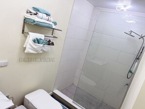 Shower, hair dryer, towels, soap