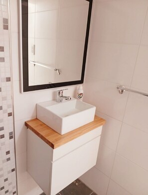 Hair dryer, towels, soap, toilet paper