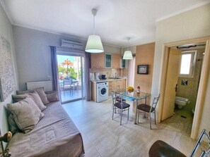 Deluxe-huoneisto, parveke, kaupunkinäköala | Ilmainen Wi-Fi