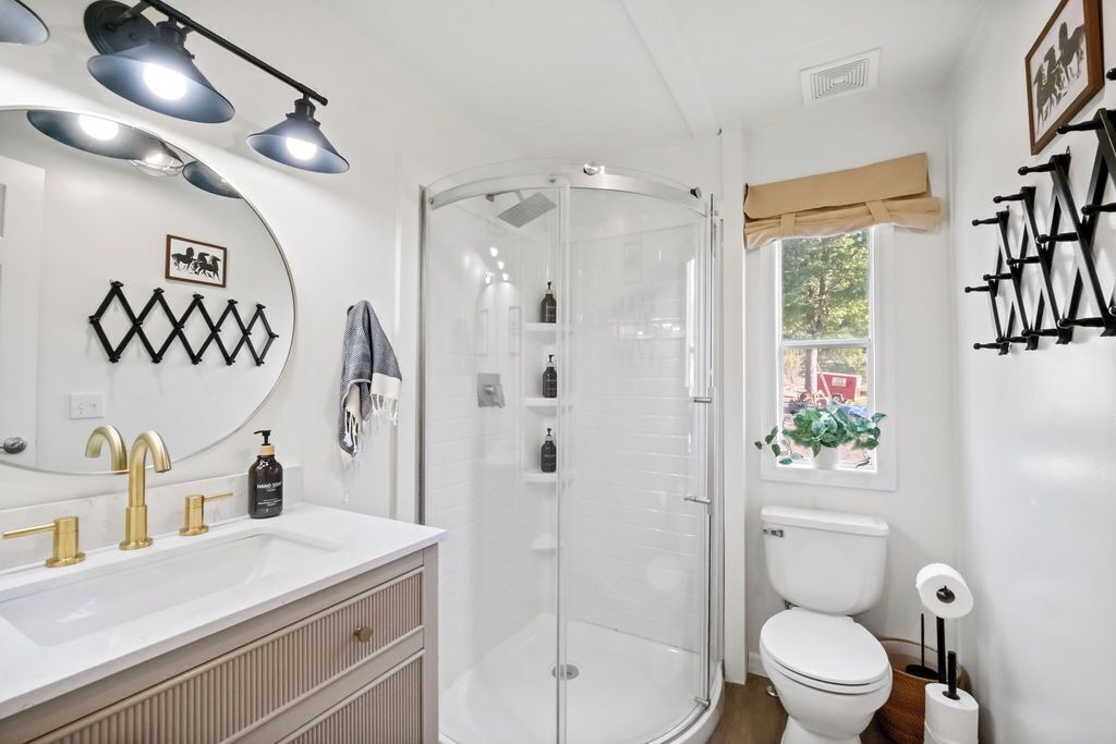 Shower, towels, soap, toilet paper