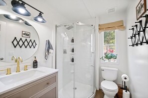 Shower, towels, soap, toilet paper