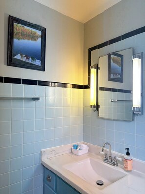 Hair dryer, towels, soap, toilet paper