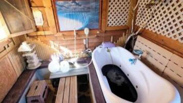 Bidet, towels, soap, toilet paper