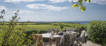 Besloe is a beautifully preserved Grade II listed Cornish five bedroom home