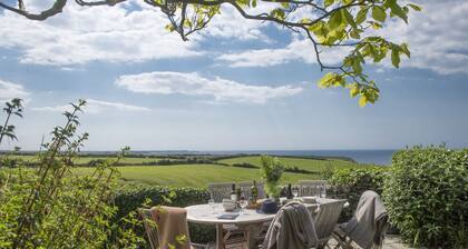 Besloe is a beautifully preserved Grade II listed Cornish five bedroom home
