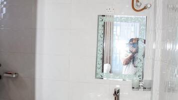Shower, towels, soap, shampoo