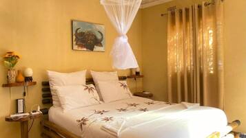 Deluxe Double Room, Courtyard View | Individually decorated, individually furnished, desk, laptop workspace