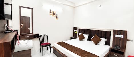 Deluxe Quadruple Room, City View | In-room safe, soundproofing, free WiFi, bed sheets