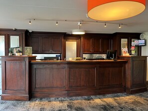 Enjoy cooking in this well-equipped kitchen with a central island, sink, and modern appliances.