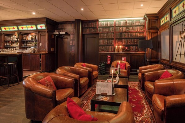 Relax in style with leather armchairs and a cozy coffee table.