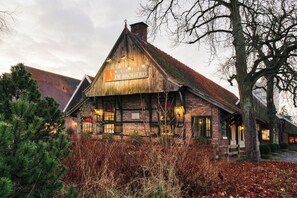 Experience the charm of this historic restaurant, set amidst a serene natural setting with mature trees and a beautifully maintained lawn.