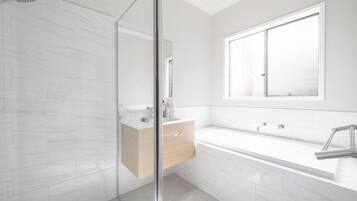Shower, hair dryer, towels, soap