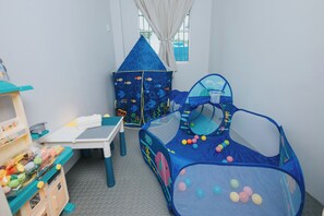 Children’s area - lot 17 Charming 3-bedroom house with WiFi, AC in Ranau (RANAU)