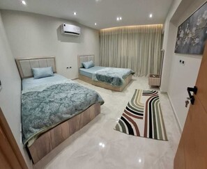 3 dormitorios, tabla de planchar con plancha, wifi gratis y ropa de cama