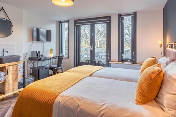 Deluxe Room, Balcony | In-room safe, desk, laptop workspace, free WiFi