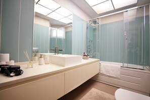 Hair dryer, bidet, towels, soap