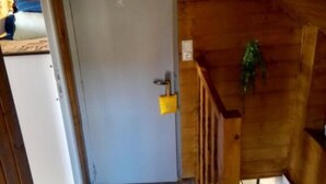 A wooden interior with a door labeled "DOUCHE". - Charming House in Cros - 3 pers, Volcano Park (Cros)