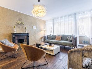 TV, fireplace, books