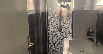 I rent a bedroom, a living room, a kitchen, a toilet and a shower room.